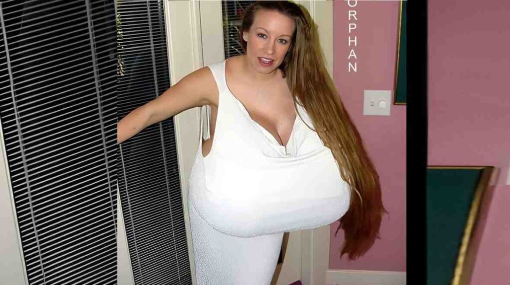 Chelsea Charms in a white dress stands beside with long hair, smiling in a bright outdoor setting
