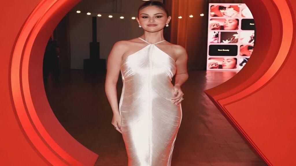 Selena Gomez showcases a stylish white dress, perfect for fall fashion trends.