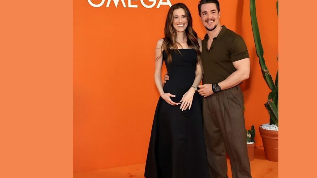 Allison Williams and Alexander Dreymon smiling together, announcing they are expecting their first child.