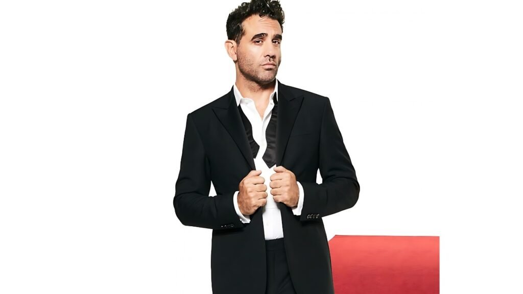 Bobby Cannavale in a tuxedo poses confidently for a photo, showcasing a formal and elegant appearance.