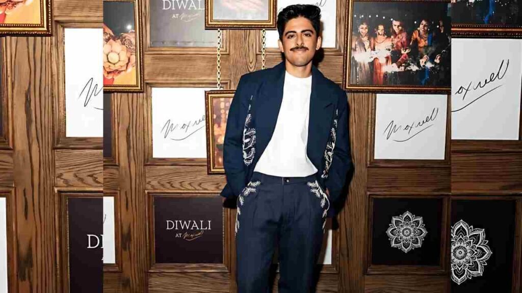 Karan Brar dressed in traditional clothing celebrate Diwali with lights, decorations, and festive activities at the event.