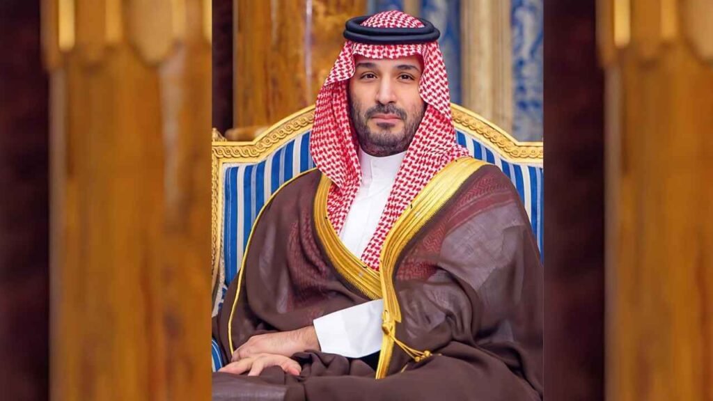 Portrait of King Mohammed bin Salman Saud of Saudi Arabia, dressed in traditional attire, seated and looking forward.
