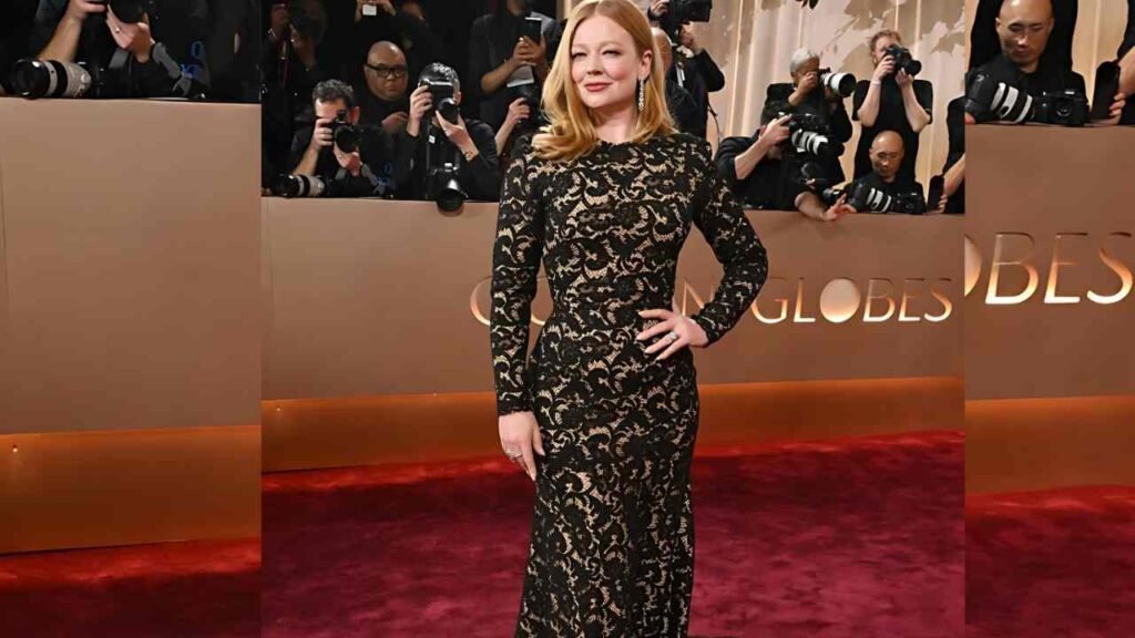 Sarah Snook in a stunning black lace gown attends the Oscars, showcasing elegance on the red carpet